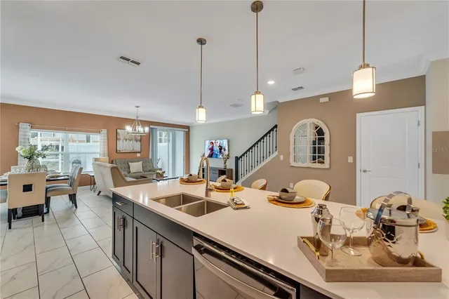a bathroom with a toilet sink vanity and mirror
