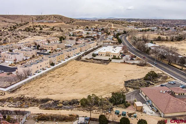 an aerial view of ocean with residential house and ocean view