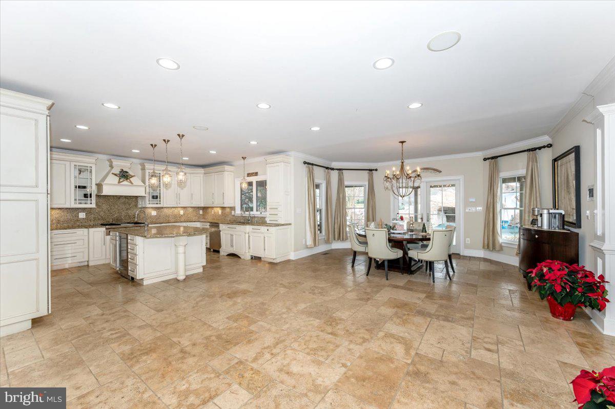 11793 Frederick Road Ellicott City, MD 21042 - Photo 11 of 46 a living room with furniture and kitchen view