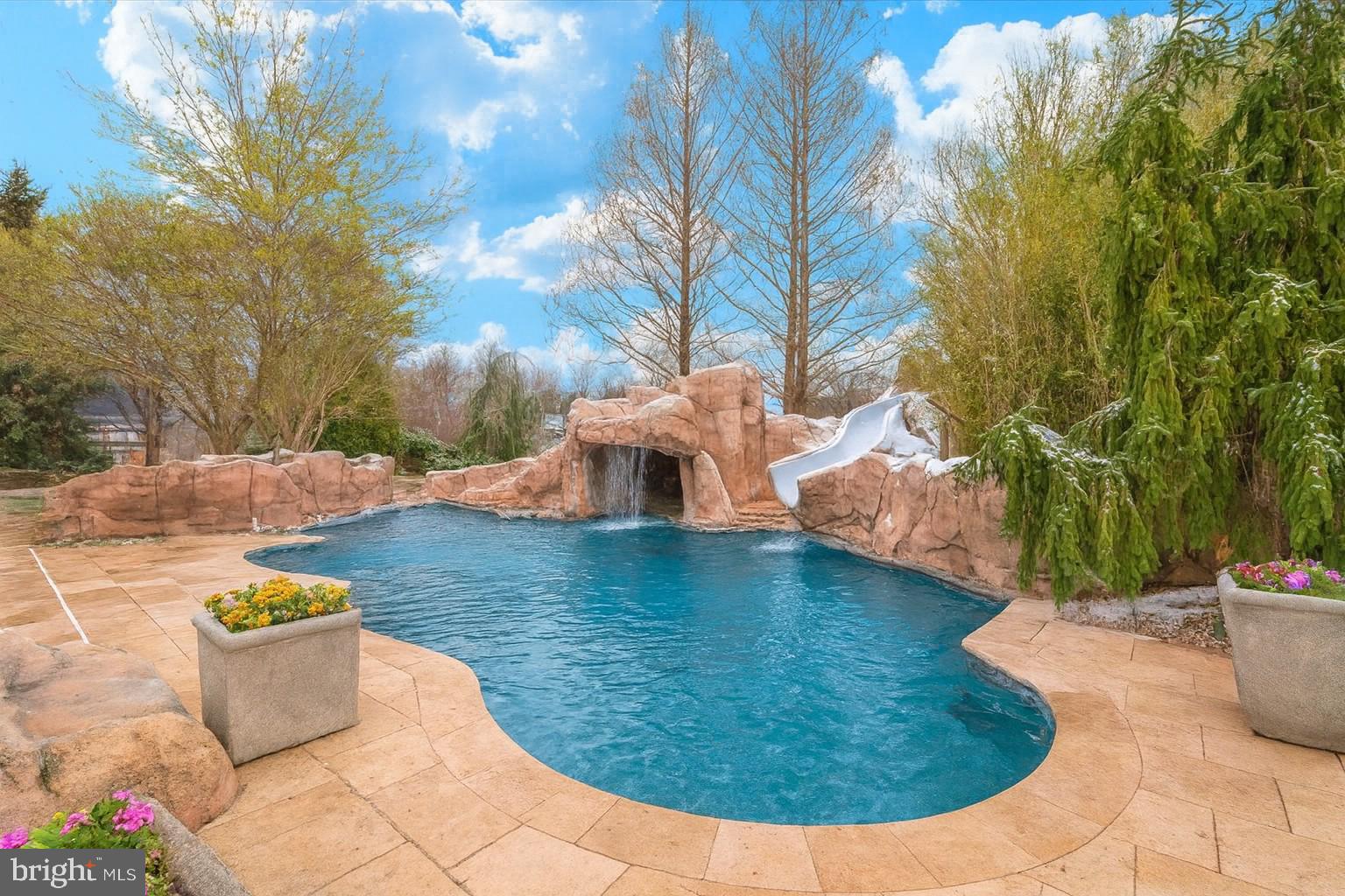 11793 Frederick Road Ellicott City, MD 21042 - Photo 2 of 46 a view of a swimming pool with an outdoor space