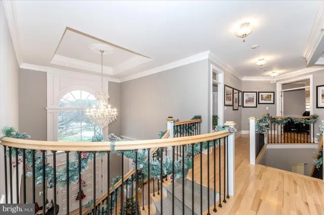 a view of a living room with a wooden floor