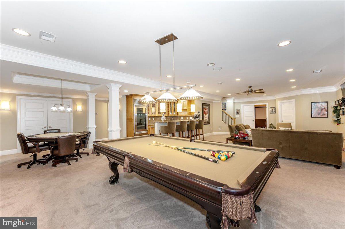 11793 Frederick Road Ellicott City, MD 21042 - Photo 25 of 46 a living room with hard wood floor pool table and furniture