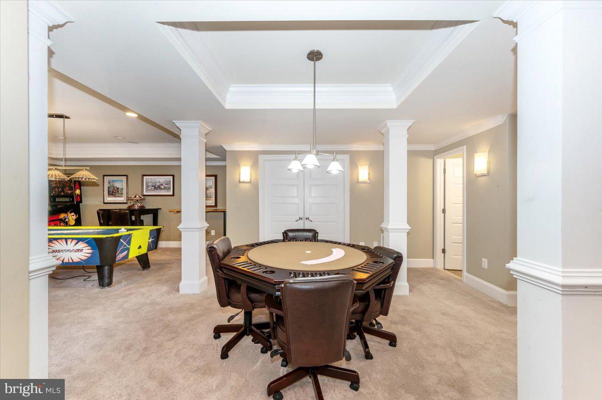 11793 Frederick Road Ellicott City, MD 21042 - Photo 26 of 46 a view of a dining room with furniture and chandelier