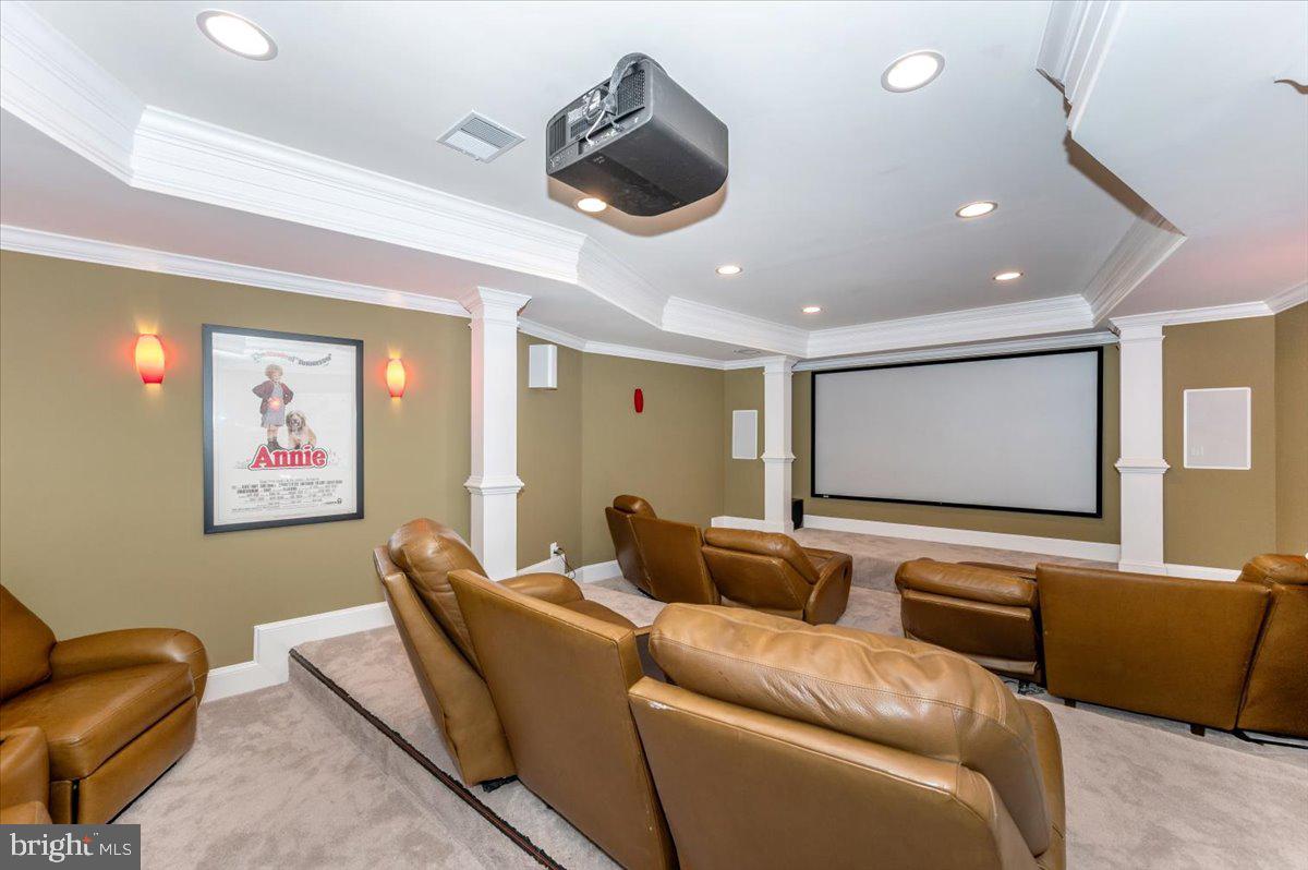 11793 Frederick Road Ellicott City, MD 21042 - Photo 28 of 46 a media room with furniture and a projector