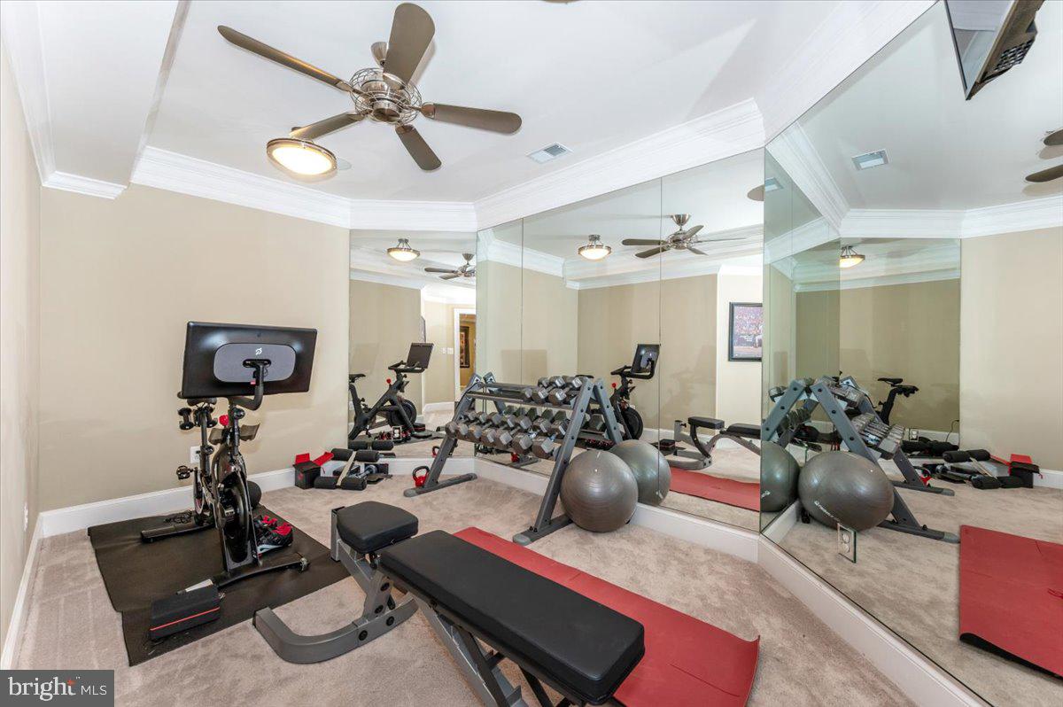 11793 Frederick Road Ellicott City, MD 21042 - Photo 29 of 46 a room with gym equipment and view of living room