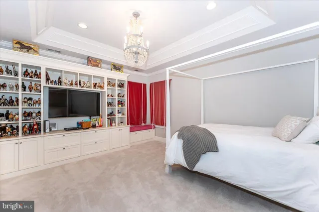 a kitchen with stainless steel appliances a stove a refrigerator a chimney a sink and a refrigerator