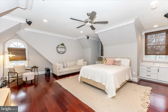 a picture of a room with a white wall and a picture