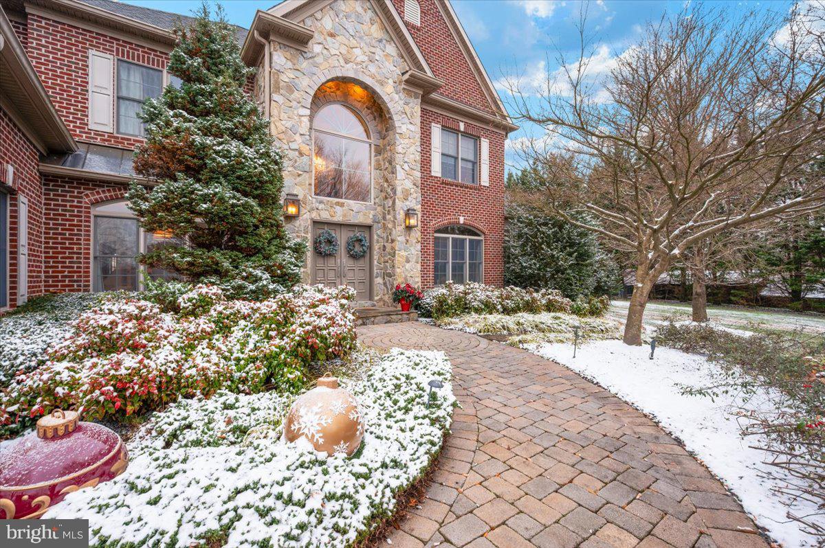 11793 Frederick Road Ellicott City, MD 21042 - Photo 5 of 46 a front view of a house with a yard