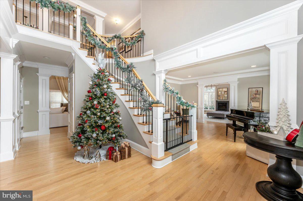 11793 Frederick Road Ellicott City, MD 21042 - Photo 6 of 46 a view of entryway with livingroom and wooden floor