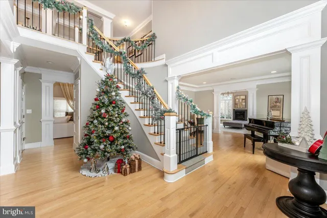 a view of entryway with livingroom and wooden floor