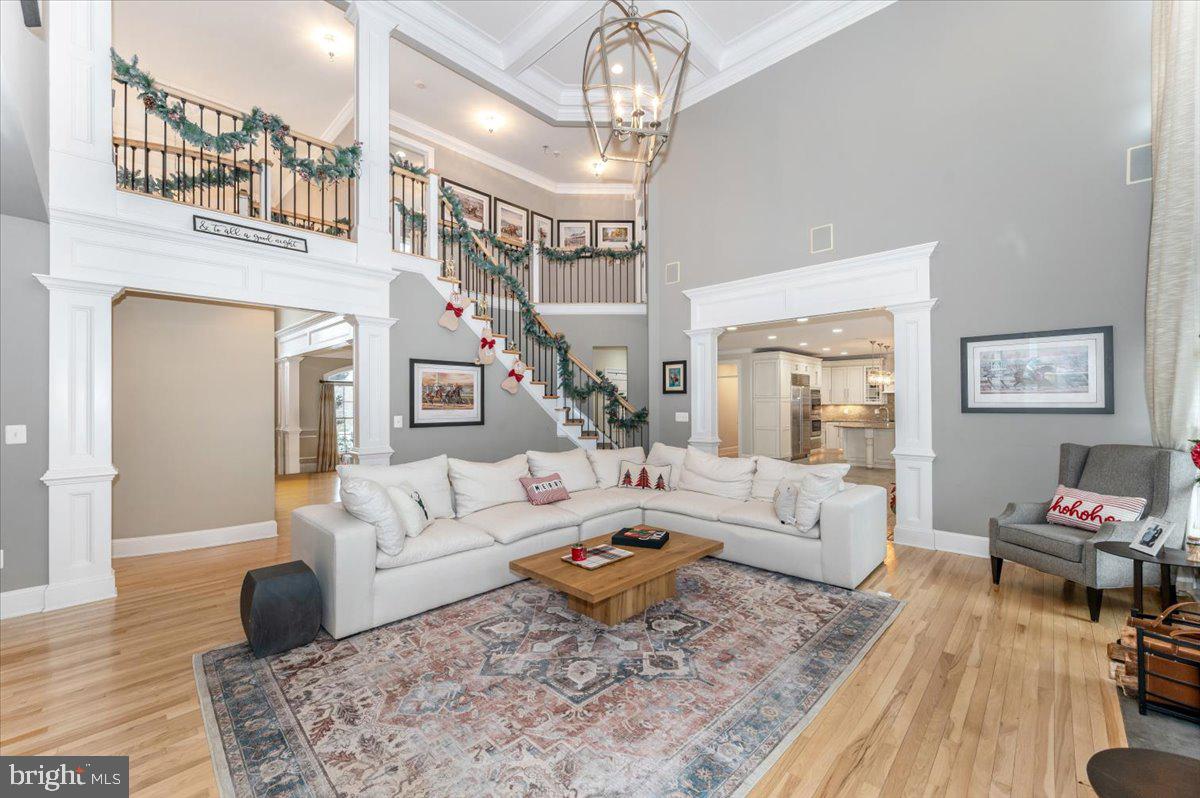 11793 Frederick Road Ellicott City, MD 21042 - Photo 10 of 46 a living room with furniture or couch and a wooden floor