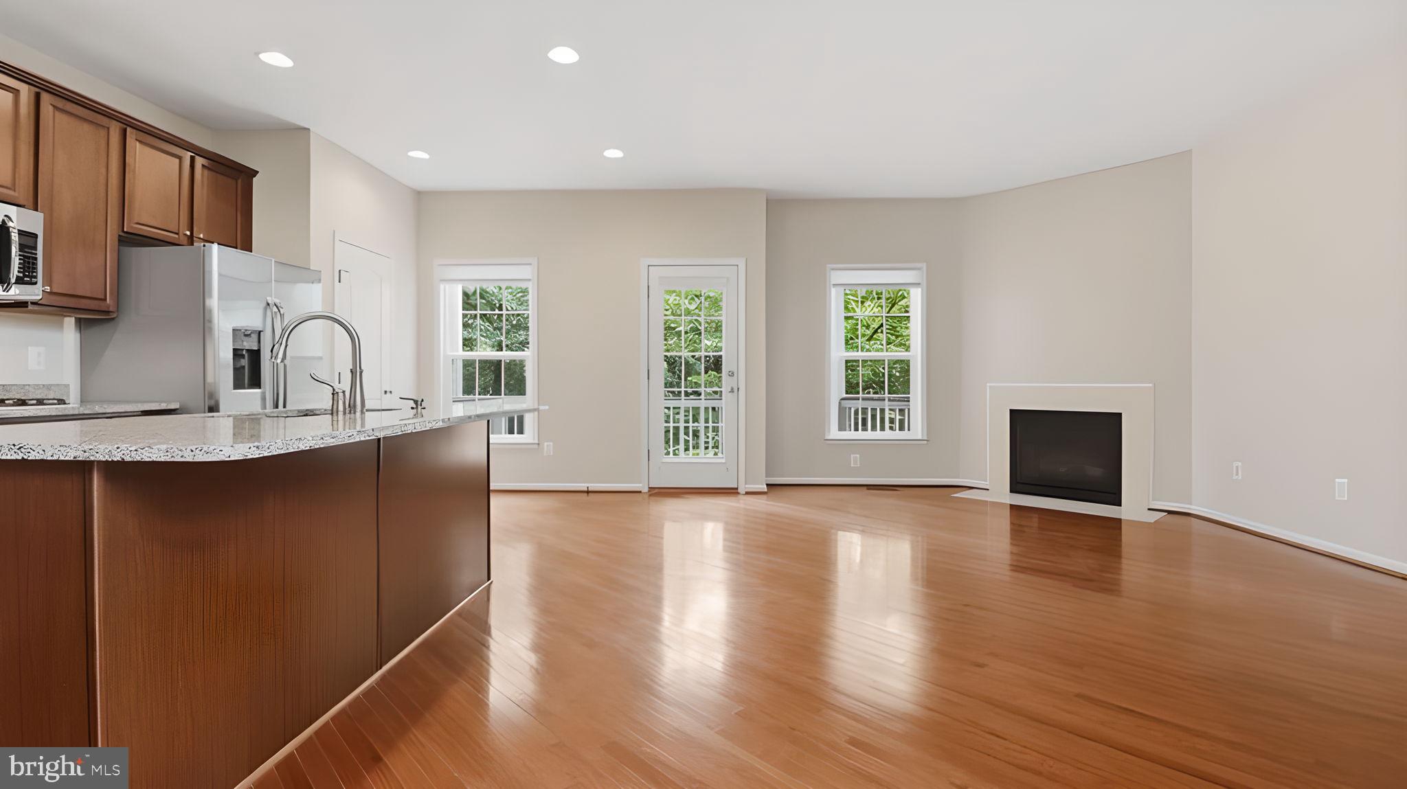 42371 Trellis Square Brambleton, VA 20148 - Photo 60 of 70 Bright and airy open living space.