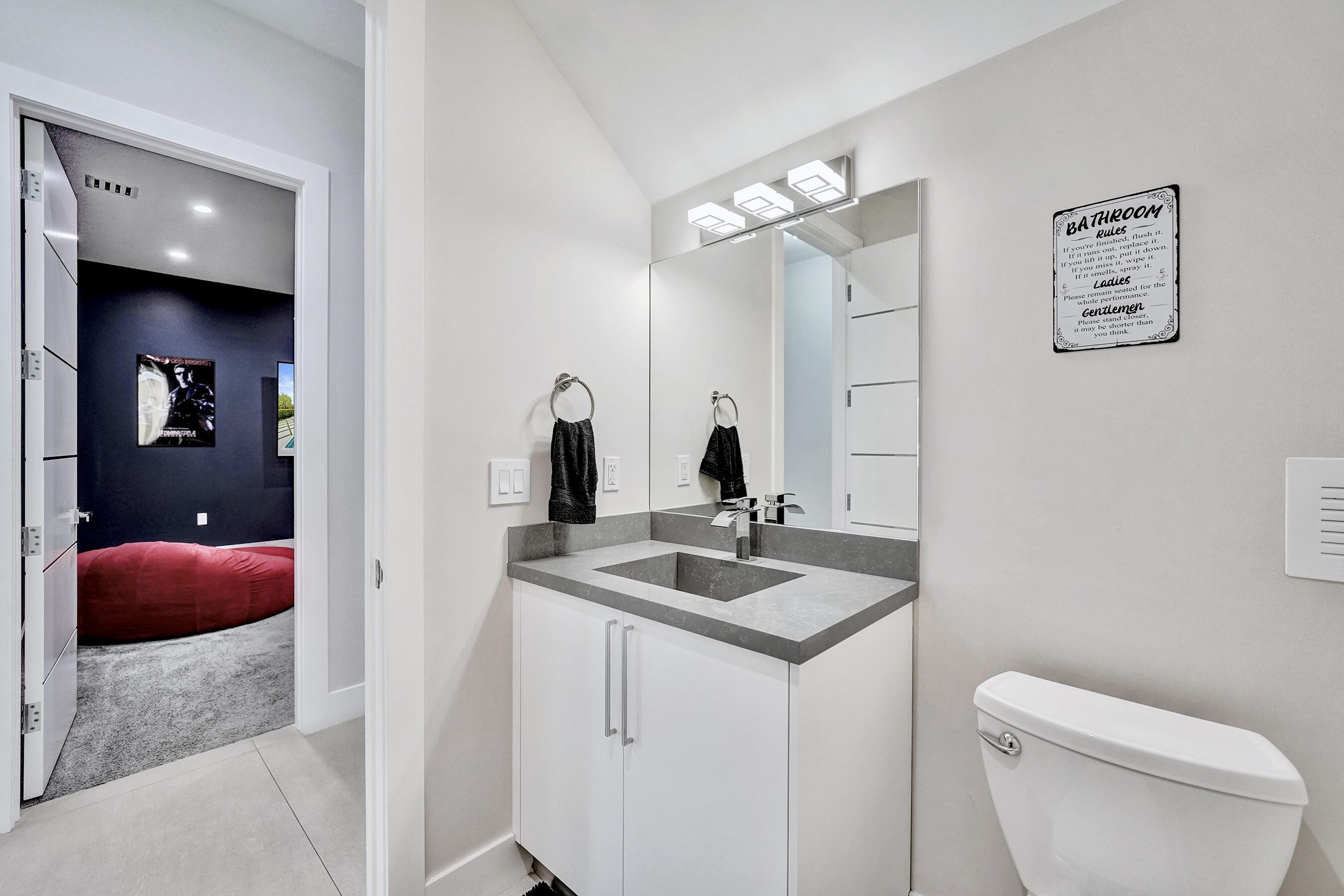 11201 Southwest 3rd Street Plantation, FL 33325 - Photo 33 of 79 Half bathroom downstairs
