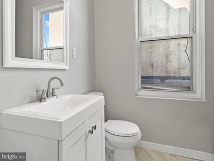 a bathroom with a sink and a toilet