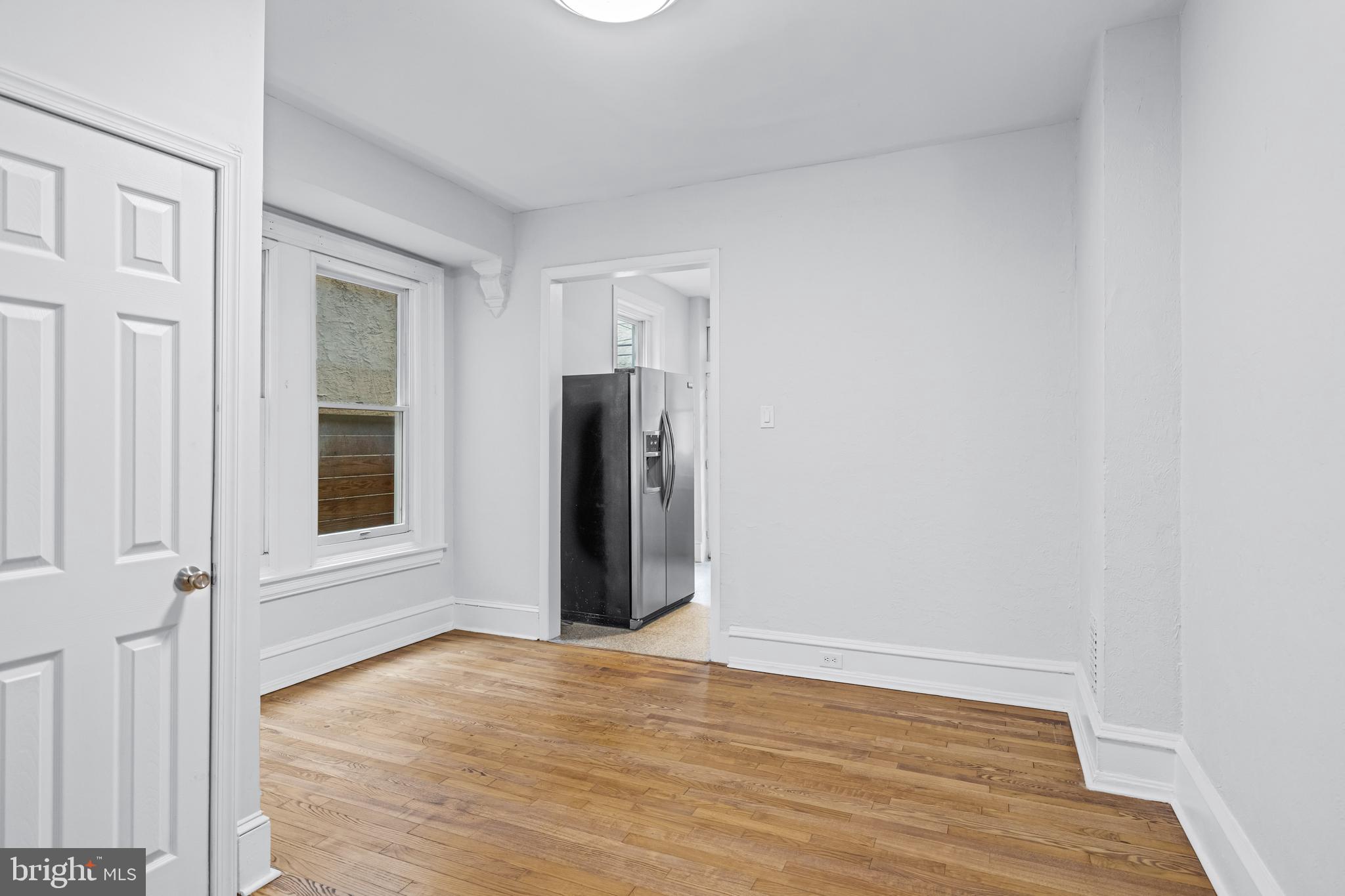 2303 Christian Street Philadelphia, PA 19146 - Photo 9 of 26 wooden floor in an empty room