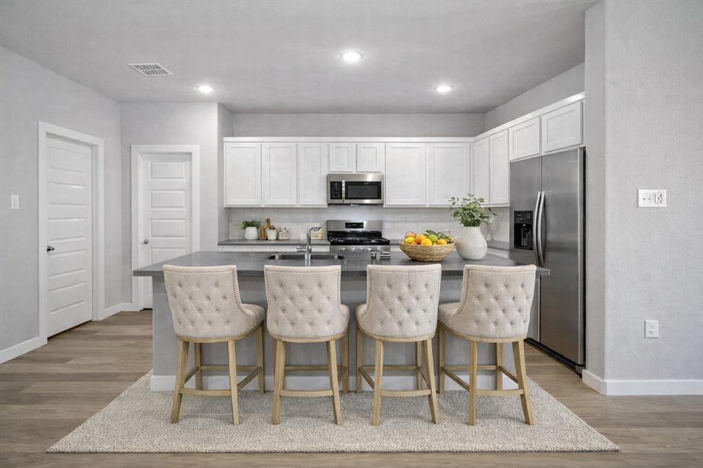 2203 Windsong Path Princeton, TX 75407 - Photo 2 of 12 kitchen virtually staged