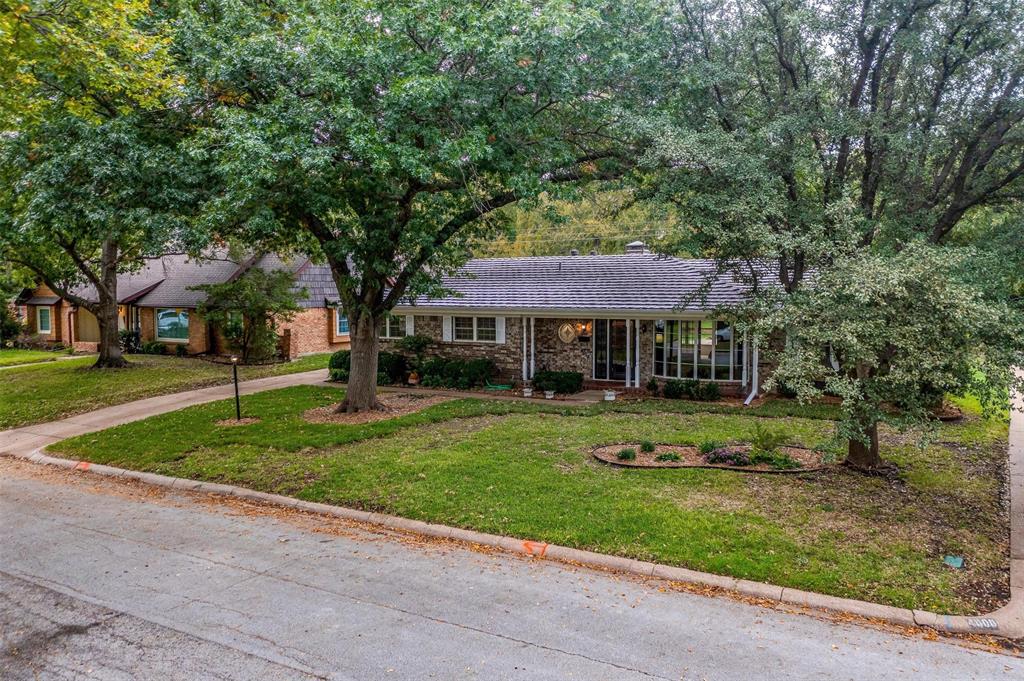4012 Dawn Drive Benbrook, TX 76116 - Photo 1 of 1 a front view of a house with a yard