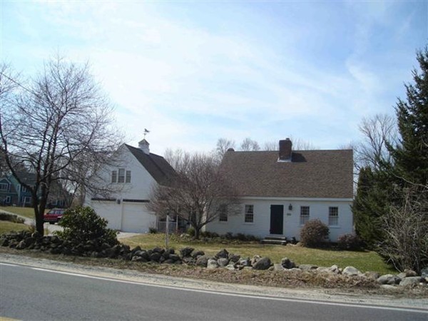 111 Bay Road Easton, MA 02356 - Photo 3 of 30 a front view of a house with a yard and garage