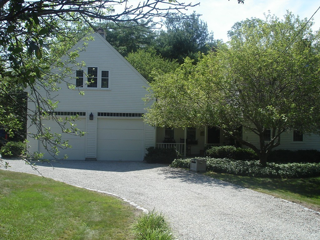 111 Bay Road Easton, MA 02356 - Photo 4 of 30 a backyard of a house with plants and trees