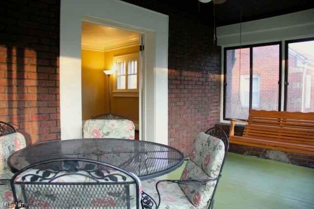 347 Merriman Road Akron, OH 44303 - Photo 10 of 25 Through the french doors off the living room is this large sunroom/ porch.
