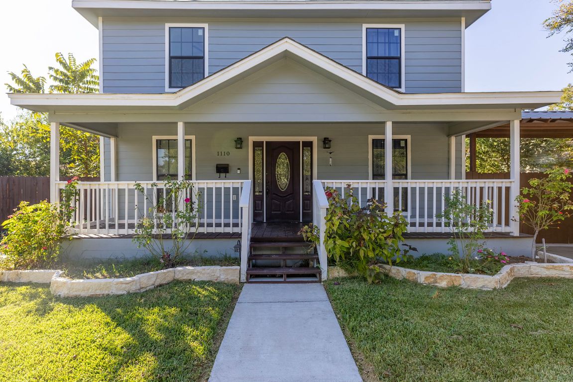 1110 South 9th Street Temple, TX 76504 - Photo 1 of 27 a front view of a house with garden
