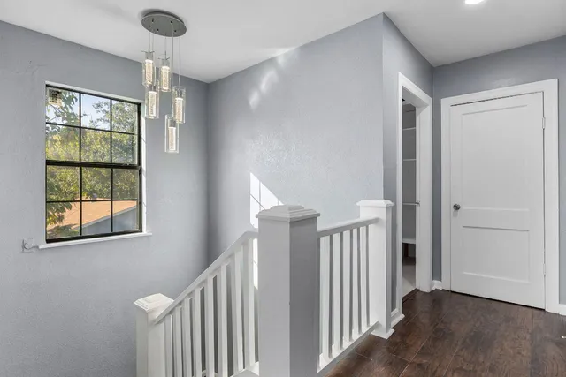 a view of entryway with stairs and wooden floor