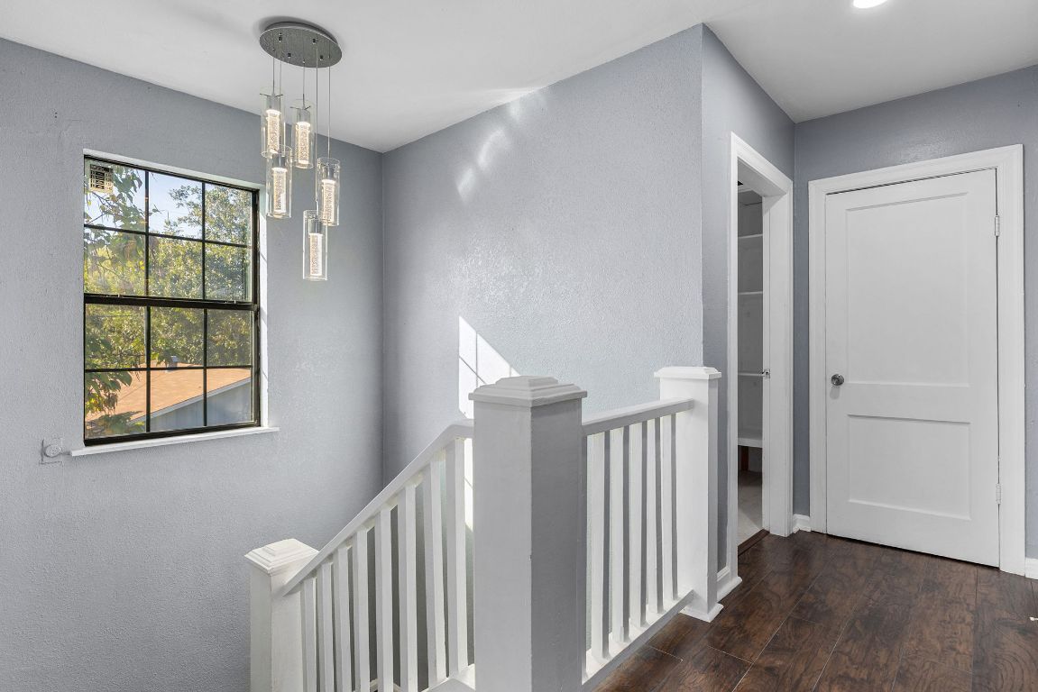 1110 South 9th Street Temple, TX 76504 - Photo 16 of 27 a view of entryway with stairs and wooden floor