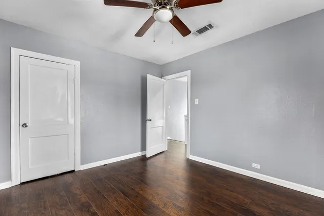 a view of entryway with wooden floor