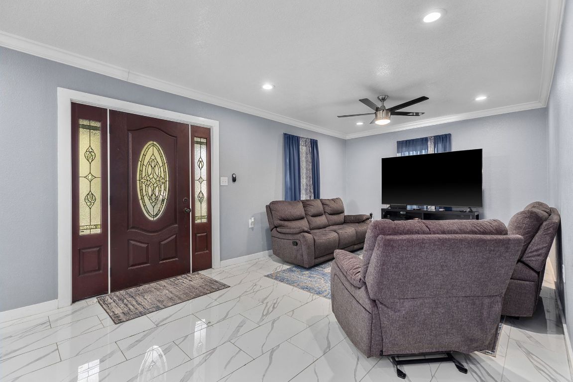1110 South 9th Street Temple, TX 76504 - Photo 6 of 27 a living room with furniture and a flat screen tv
