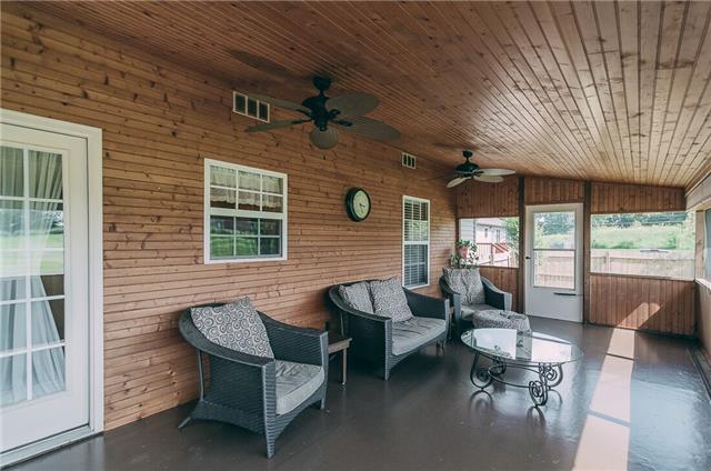 789 Rock Springs Road Castalian Springs, TN 37031 - Photo 15 of 20 Amazing all pine 12 x 24 screened in sun porch with built in shades!