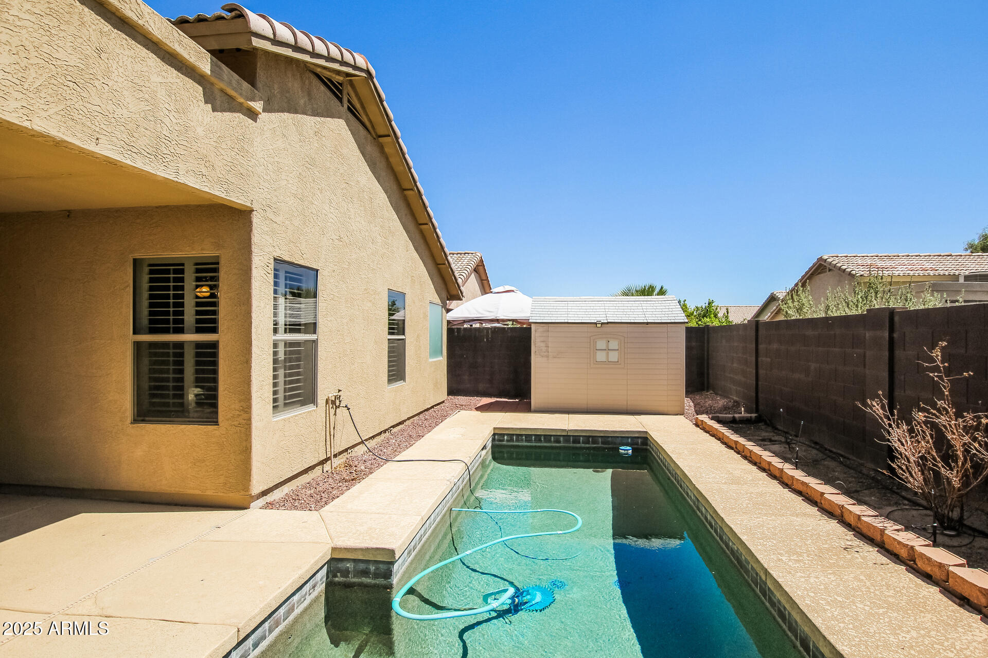 3750 South Conestoga Road Apache Junction, AZ 85119 - Photo 19 of 21 a view of a house with a backyard