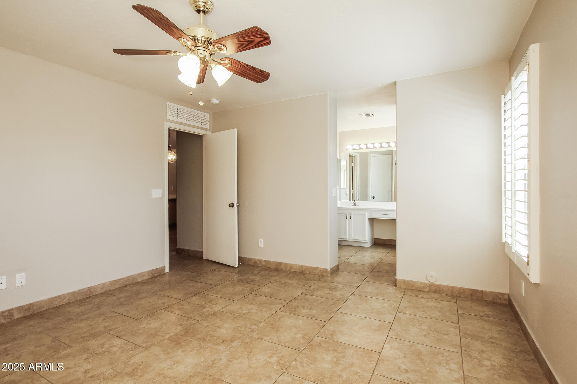 3750 South Conestoga Road Apache Junction, AZ 85119 - Photo 9 of 21 a view of an empty room with a window
