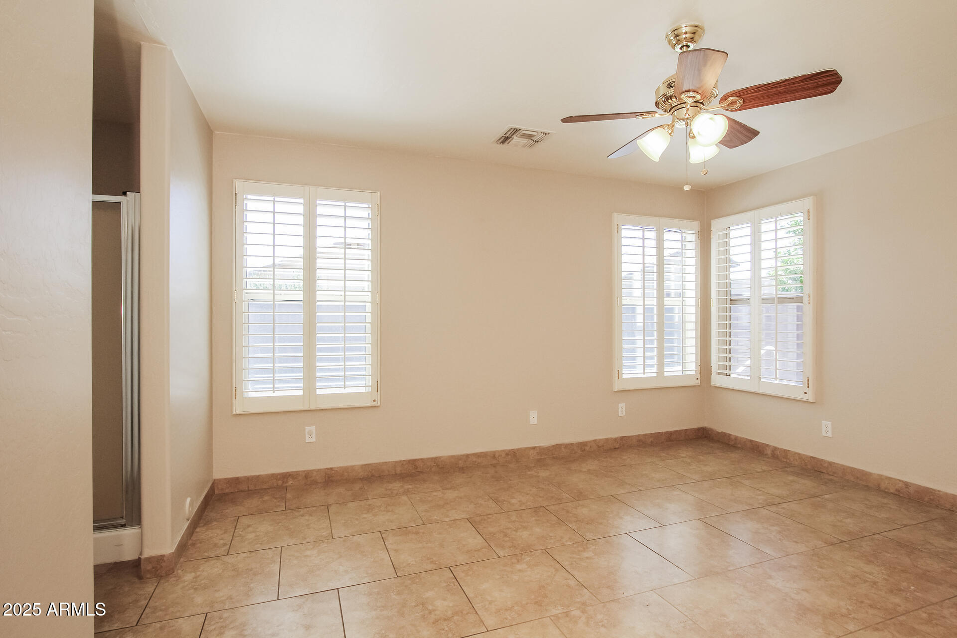 3750 South Conestoga Road Apache Junction, AZ 85119 - Photo 10 of 21 a view of an empty room with a window