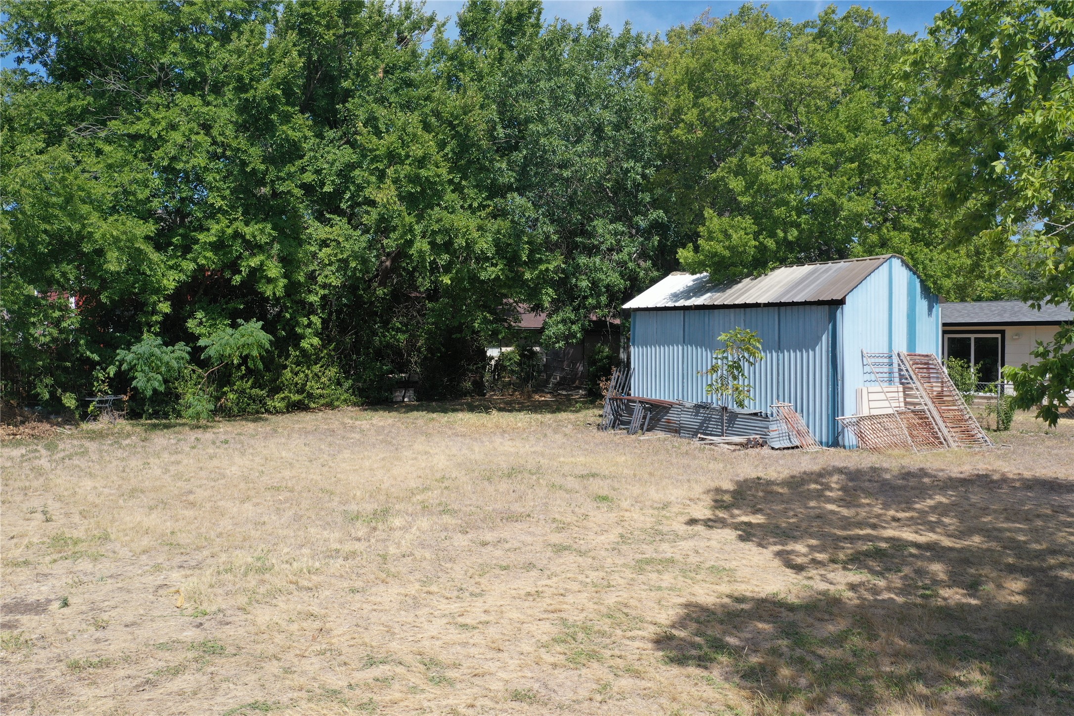 910 East 20th Street Georgetown, TX 78626 - Photo 11 of 19 a view of a house with a yard and tree