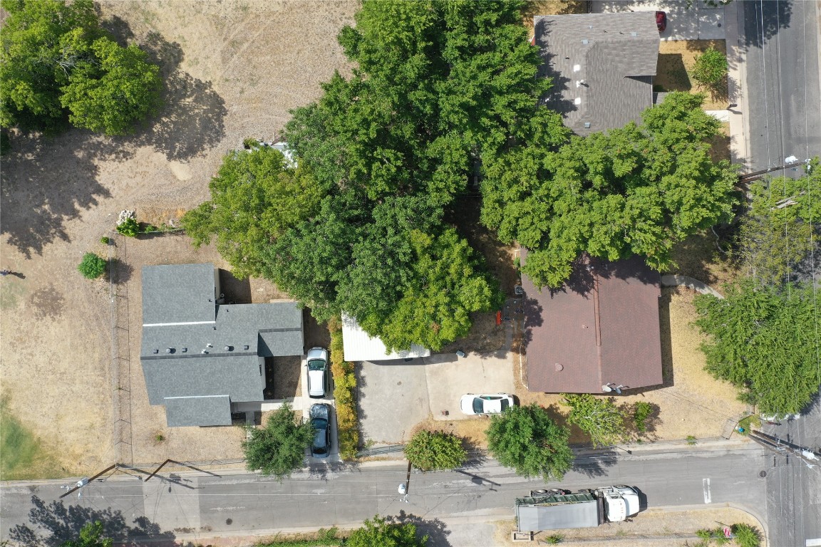 910 East 20th Street Georgetown, TX 78626 - Photo 2 of 19 an aerial view of multiple houses with yard