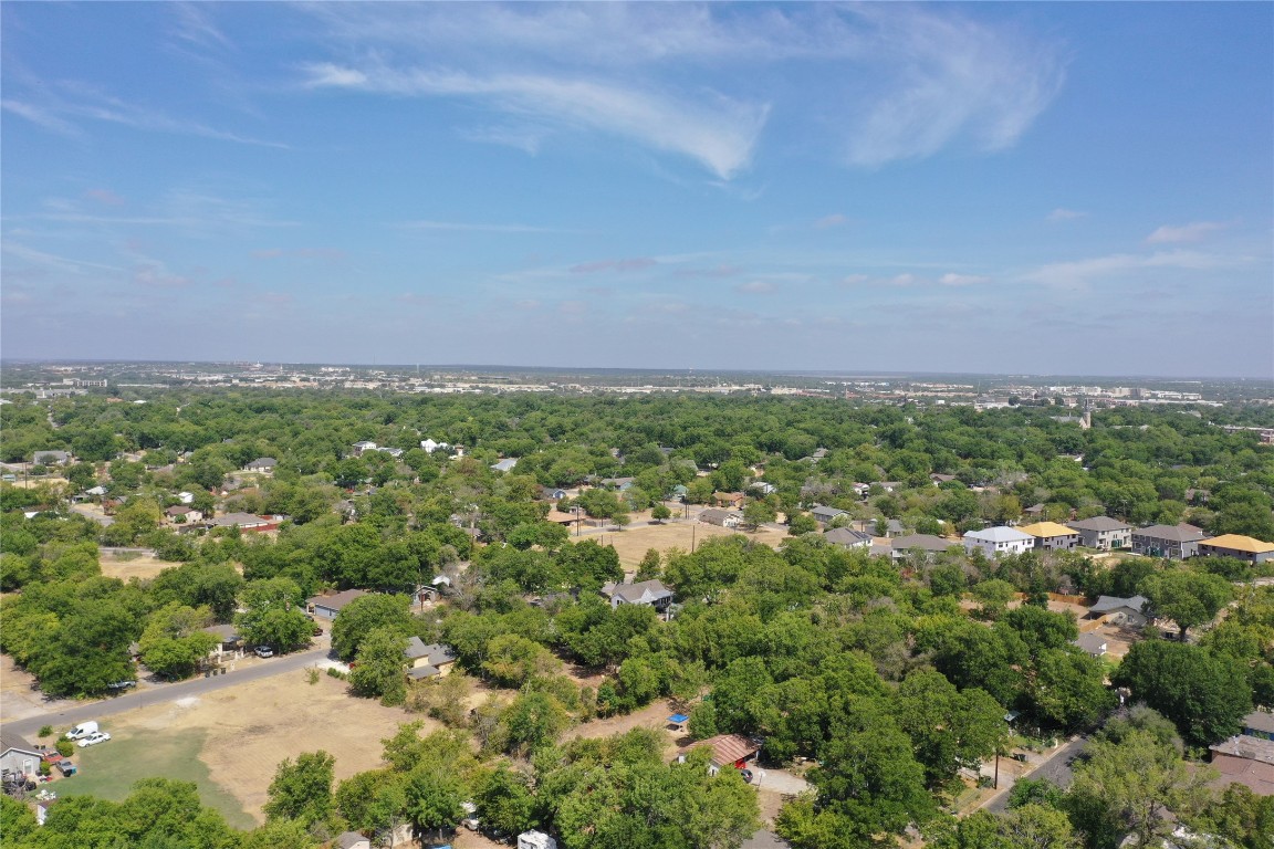 910 East 20th Street Georgetown, TX 78626 - Photo 6 of 19 an aerial view of residential houses with outdoor space and trees