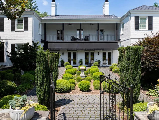 a front view of a house with a porch
