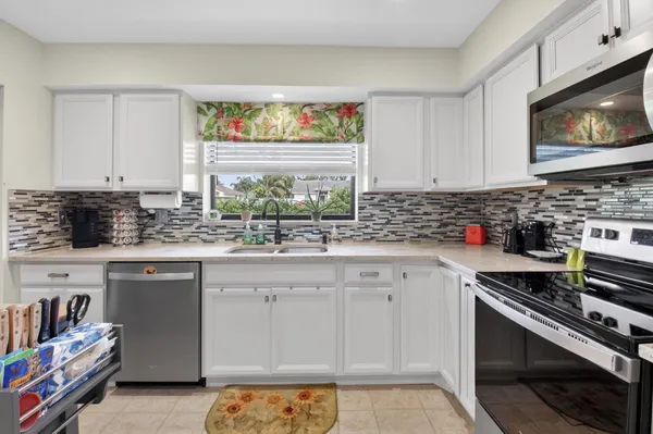 $264,900 | 9825 Tabebuia Tree Drive, Unit A, Boynton Beach, FL 33436
