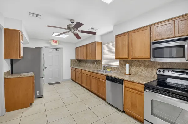 $264,900 | 9825 Tabebuia Tree Drive, Unit A, Boynton Beach, FL 33436