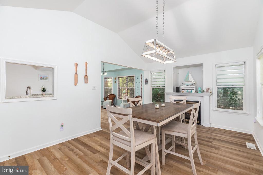 51 Martinique Circle Ocean Pines, MD 21811 - Photo 14 of 49 a view of a dining room with furniture window and wooden floor