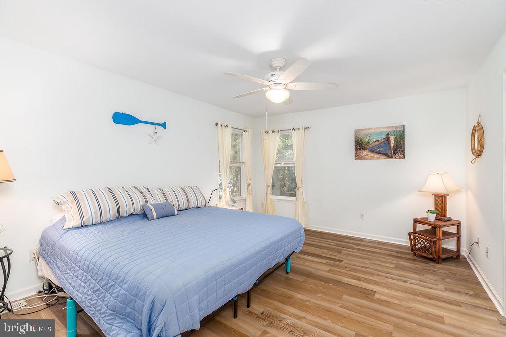 51 Martinique Circle Ocean Pines, MD 21811 - Photo 16 of 49 a bedroom with a bed and a table