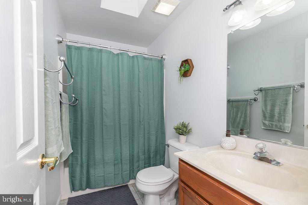 51 Martinique Circle Ocean Pines, MD 21811 - Photo 27 of 49 a bathroom with a sink a toilet and shower