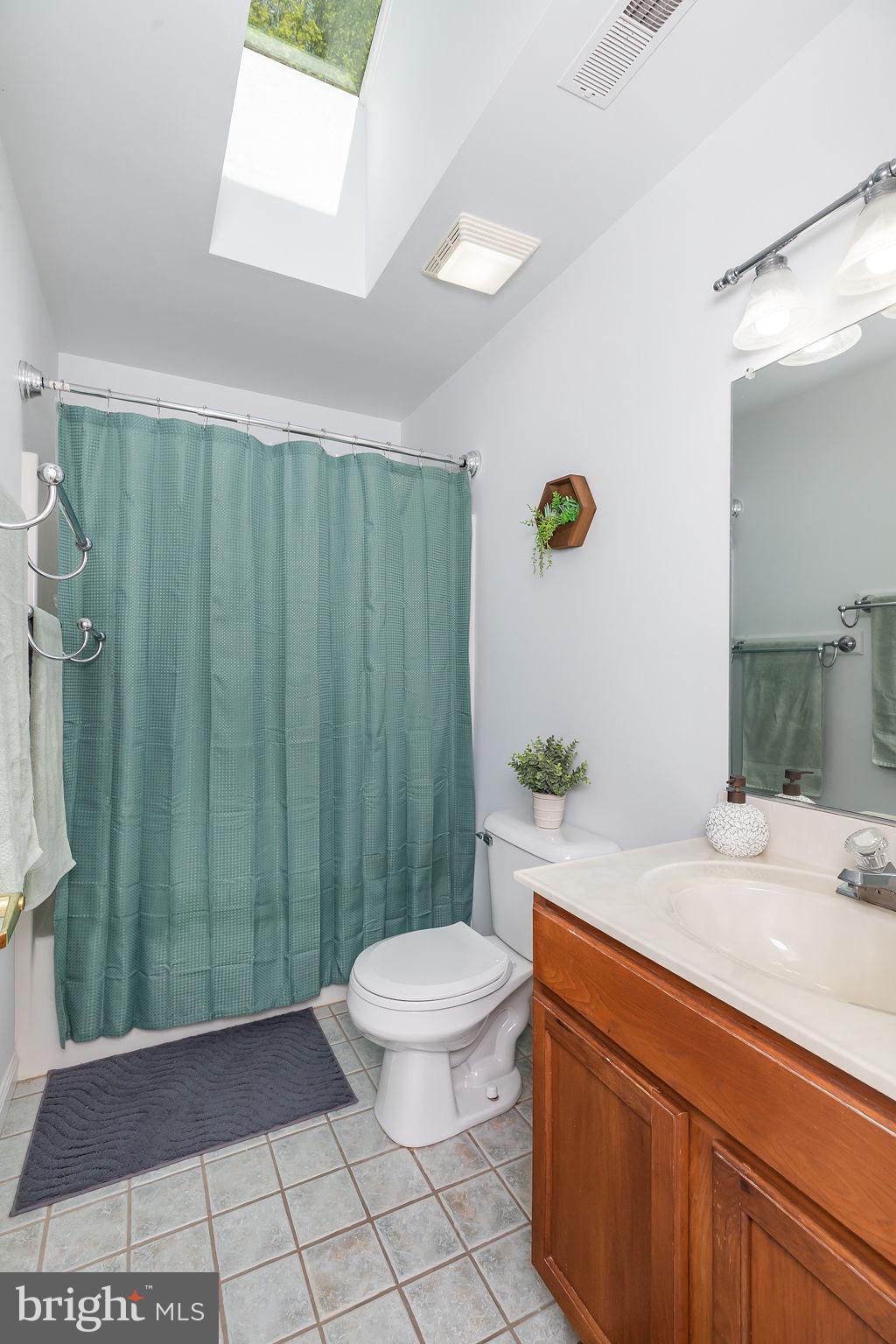 51 Martinique Circle Ocean Pines, MD 21811 - Photo 28 of 49 a bathroom with a toilet a sink and shower