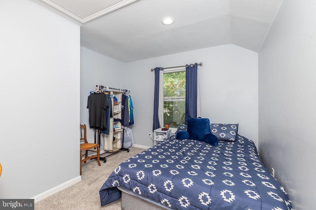 51 Martinique Circle Ocean Pines, MD 21811 - Photo 32 of 49 a bedroom with a bed and a window