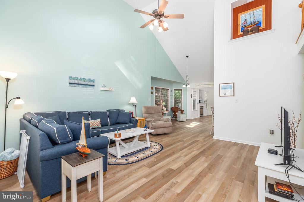 51 Martinique Circle Ocean Pines, MD 21811 - Photo 4 of 49 a living room with furniture a flat screen tv and a table