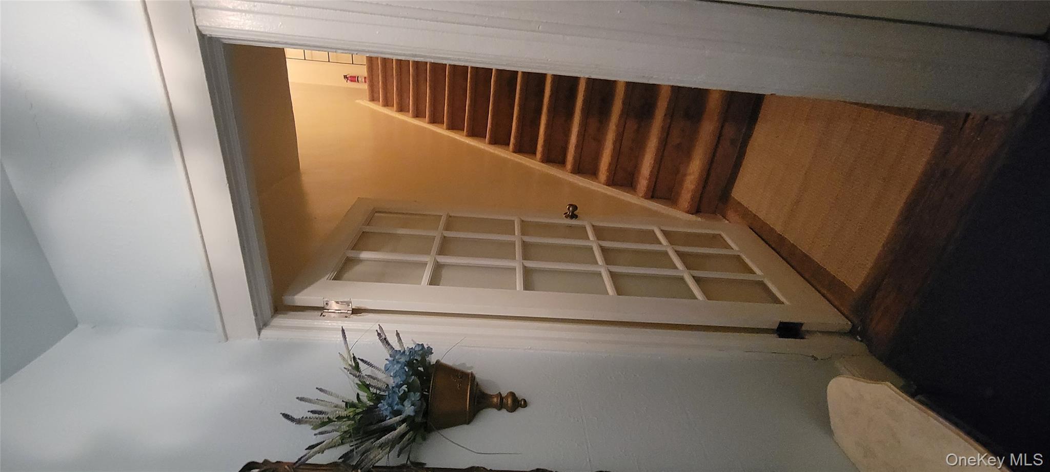 31-22 100th Street, Unit 2 Queens, NY 11369 - Photo 11 of 11 a view of entryway with wooden floor