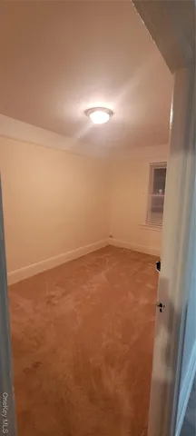 an empty room with an entryway