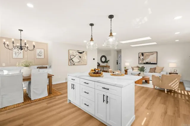 a view of a living room and kitchen