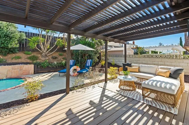 a view of a swimming pool with a patio
