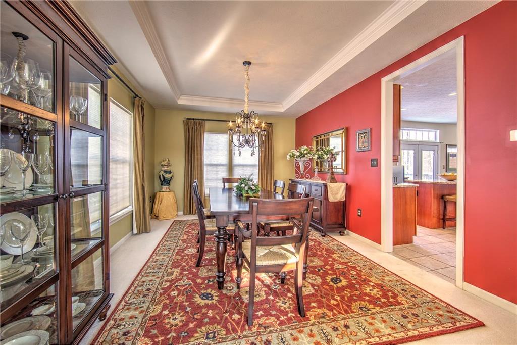 252 Field Club Circle McKees Rocks, PA 15136 - Photo 4 of 24 Formail dining room with tray ceiling...seating for 10-12...